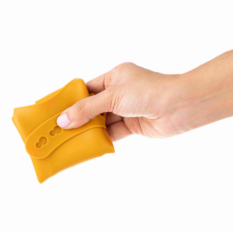 Yellow silicone bib folded 