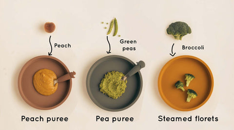 eco rascals silicone plates shown with peach puree, pea puree and steamed broccoli florets inside.
