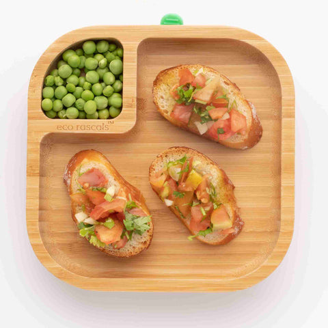 eco rascals Bamboo square plate with bruschetta toast in the large section and peas in the small section