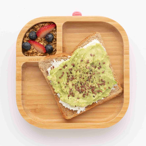 eco rascals Bamboo square plate with avocado toast in the large section and granola in the small section