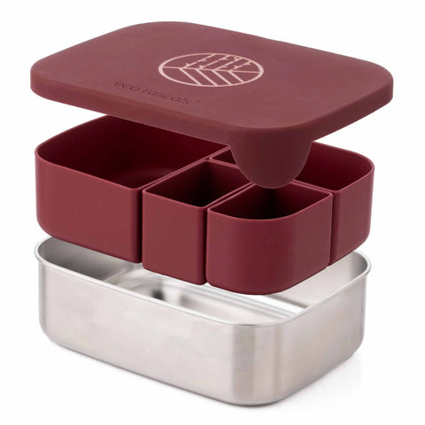 Image shows the Classic Burgundy Lunchbox by eco rascals with removable dividers and a stainless steel base with the lid, the organisers and the base floating on top of each other. 