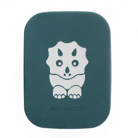 The image shows a close up in portrait form of the lunchbox lid from a Birds Eye view. You can see the rectangle shape with rounded edges and the eco rascals dinosaur on the front with the eco rascals logo embossed. The colour of the silicone lid is teal. 