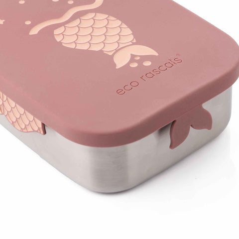 Image shows the mermaid lunchbox by eco rascals on a side angle. It's zooming into the mermaid tail handles that are on the front and left of the lunchbox.