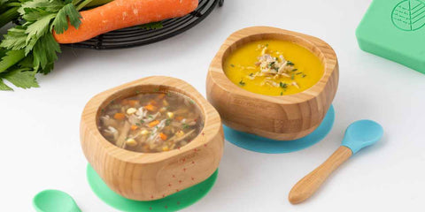 Two eco rascals bamboo bowls filled with chicken soup